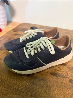 OluKai womens Navy Leather Sneakers with White Laces